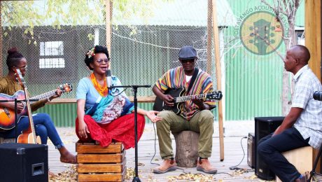 Musicians performing at a Poetavango acoustic session
