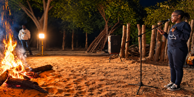 An acoustic performance around the fire at night