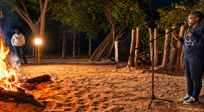 An acoustic performance around the fire at night