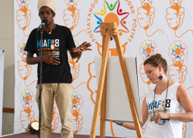 Performers on stage at the Maun International Arts Festival