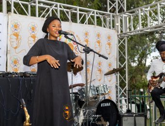 A performer reciting spoken word at Poetavango